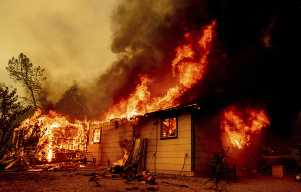 Flames consume a house near Old Oregon Trail. 